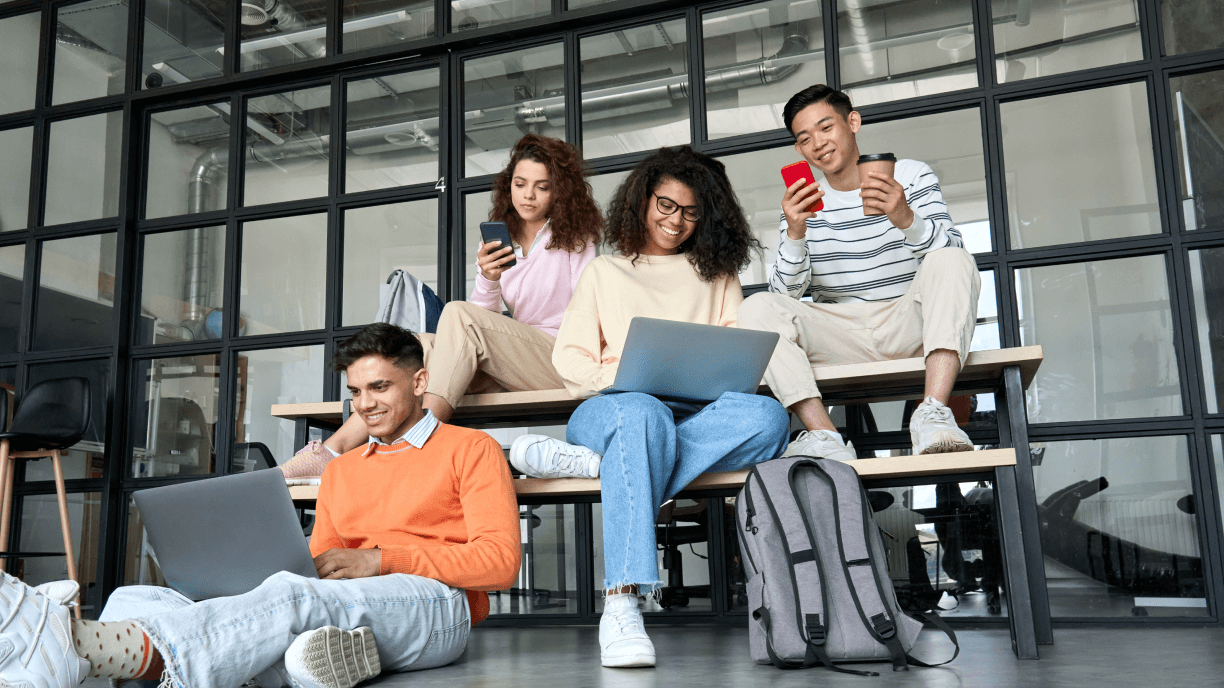 Multicultural students at high school campus using Genially Play